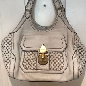 Cole Haan handbag leather in good used condition color is a grey/white